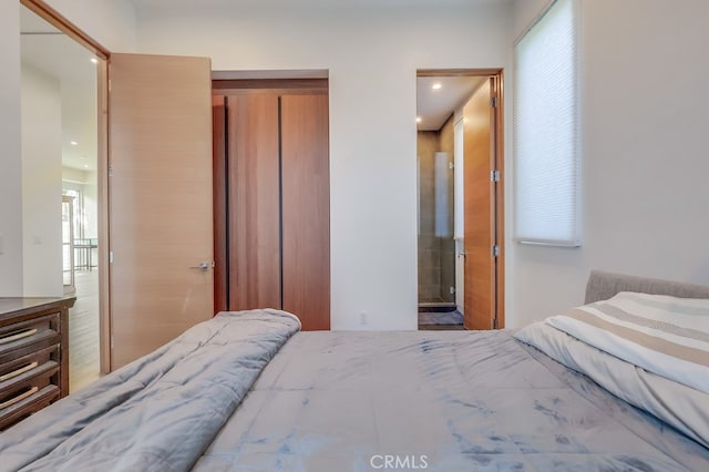 737 N Cherokee Ave, Los Angeles, CA 90038 - bedroom with recessed lighting, a closet, and ensuite bathroom