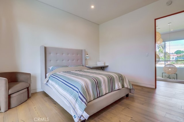 737 N Cherokee Ave, Los Angeles, CA 90038 - bedroom with baseboards, recessed lighting, and hardwood / wood-style flooring