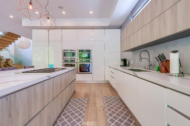 737 N Cherokee Ave, Los Angeles, CA 90038 - kitchen with modern cabinets and a sink
