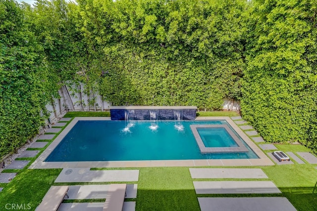 737 N Cherokee Ave, Los Angeles, CA 90038 - pool with a lawn, a fenced backyard, and an in ground hot tub