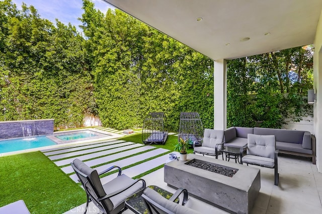 737 N Cherokee Ave, Los Angeles, CA 90038 - view of patio featuring a fenced backyard, an outdoor pool, and an outdoor living space with a fire pit