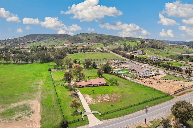 birds eye view of property featuring a rural view and a mountain view