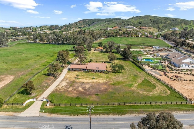drone / aerial view featuring a mountain view