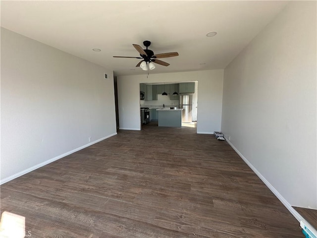 2569 Caulfield Dr, San Diego, CA 92154 - unfurnished living room with a ceiling fan and dark wood-type flooring