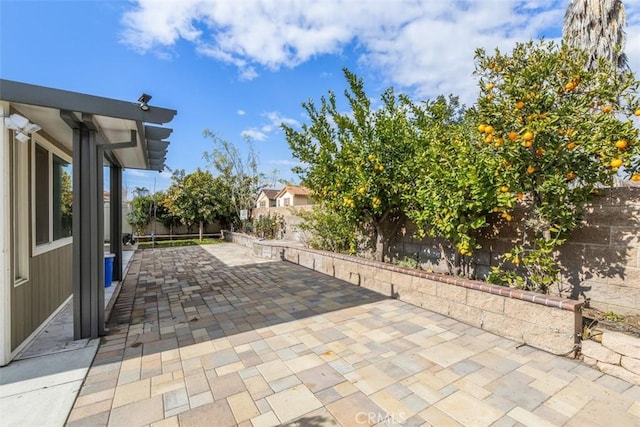 view of patio featuring a fenced backyard