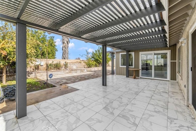 view of patio / terrace with a fenced backyard and a pergola