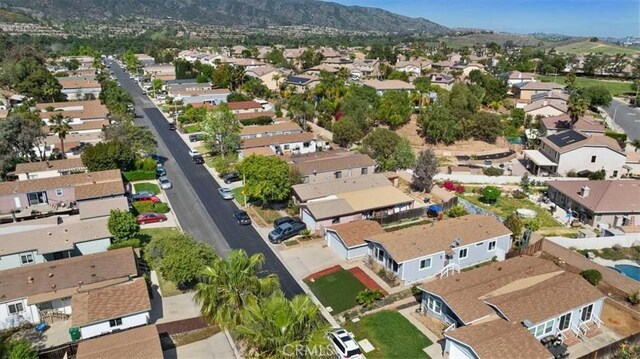 drone / aerial view with a mountain view and a residential view