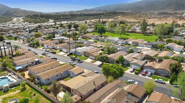 bird's eye view with a residential view and a mountain view