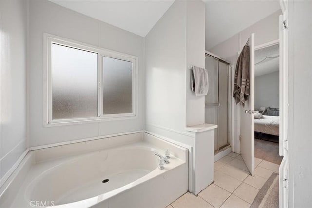 full bath with a stall shower, a garden tub, ensuite bath, and tile patterned floors