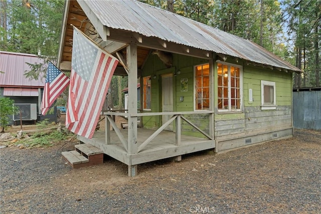 view of outdoor structure with fence