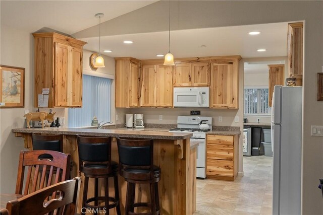 7528 Humboldt Rd, Butte Meadows, CA 95942 - kitchen featuring white appliances, light brown cabinets, a breakfast bar, a peninsula, and recessed lighting