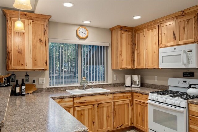 7528 Humboldt Rd, Butte Meadows, CA 95942 - kitchen with white appliances, a sink, recessed lighting, and hanging light fixtures