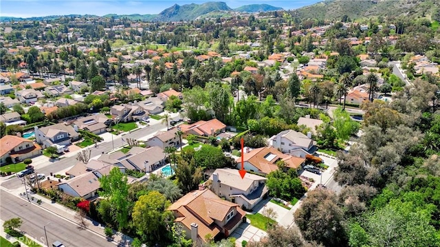 aerial view with a residential view and a mountain view