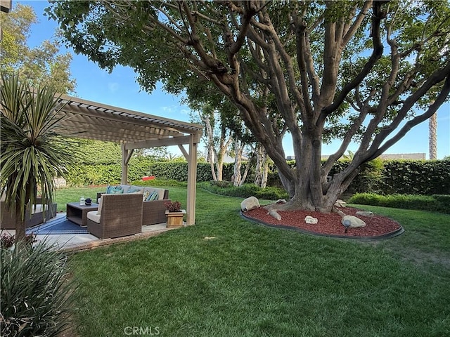 view of yard featuring a patio, an outdoor hangout area, and a pergola