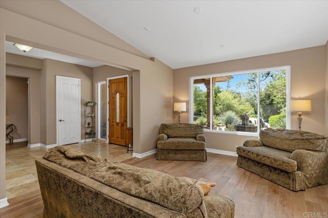 16270 Pauma Valley Dr, Pauma Valley, CA 92061 - living area with lofted ceiling and light wood-style flooring