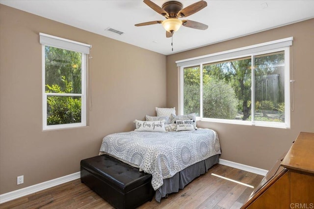 16270 Pauma Valley Dr, Pauma Valley, CA 92061 - bedroom featuring multiple windows, wood finished floors, and ceiling fan