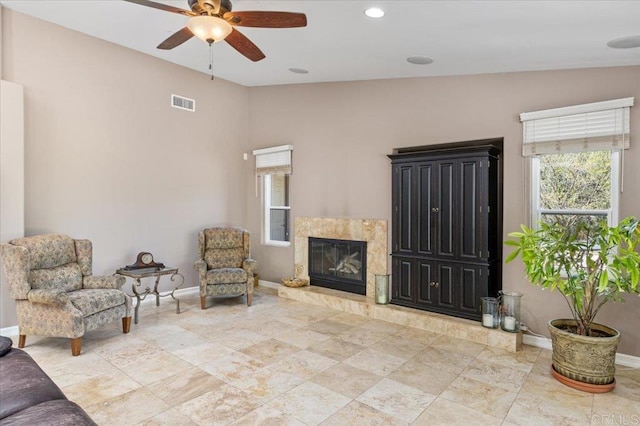 16270 Pauma Valley Dr, Pauma Valley, CA 92061 - sitting room with a ceiling fan, a high end fireplace, and recessed lighting