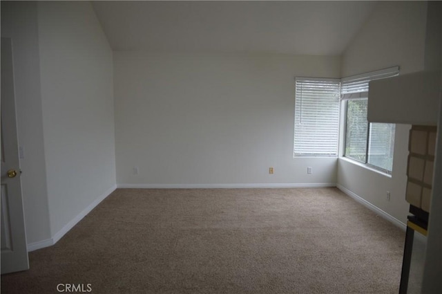24391 Rue De Gauguin, Laguna Niguel, CA 92677 - spare room featuring vaulted ceiling and carpet