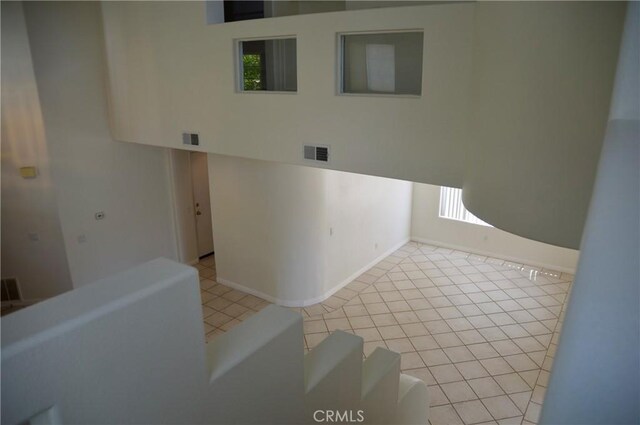 24391 Rue De Gauguin, Laguna Niguel, CA 92677 - laundry room with tile patterned floors and plenty of natural light