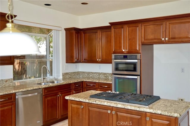 24391 Rue De Gauguin, Laguna Niguel, CA 92677 - kitchen featuring light stone counters, a sink, a kitchen island, and stainless steel appliances