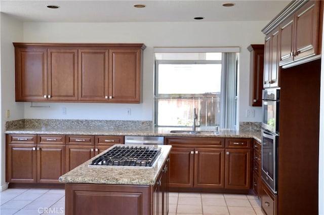 24391 Rue De Gauguin, Laguna Niguel, CA 92677 - kitchen featuring stainless steel appliances, light tile patterned flooring, and healthy amount of natural light