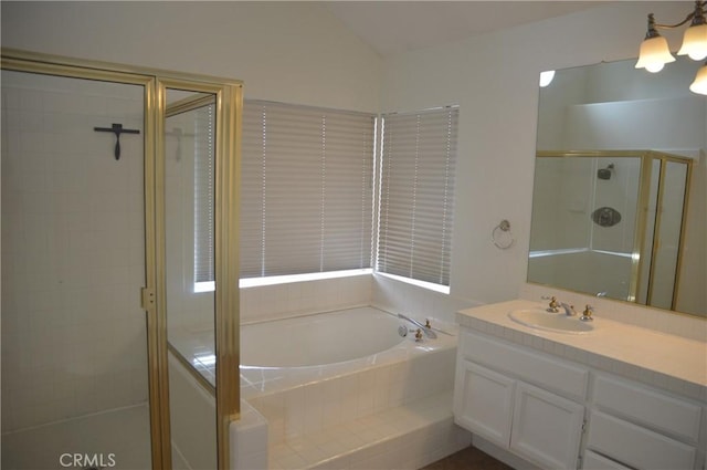 24391 Rue De Gauguin, Laguna Niguel, CA 92677 - full bath featuring vanity, a shower stall, a garden tub, and lofted ceiling