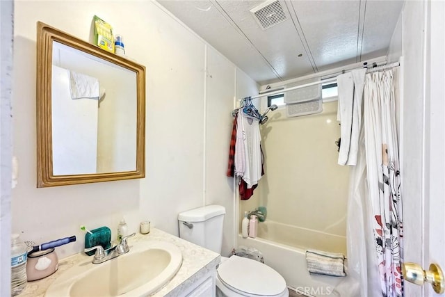 bathroom featuring visible vents, toilet, vanity, and shower / bathtub combination with curtain