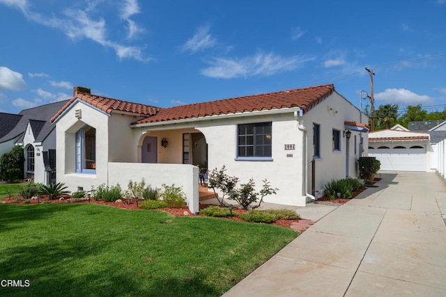 1441 Cleveland Rd, Glendale, CA 91202 - mediterranean / spanish house featuring a front lawn, stucco siding, a tiled roof, and a garage