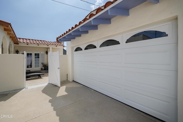 1441 Cleveland Rd, Glendale, CA 91202 - garage with french doors and concrete driveway