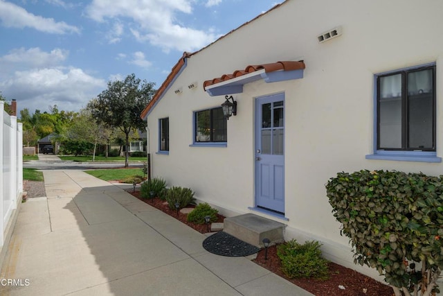 1441 Cleveland Rd, Glendale, CA 91202 - doorway to property with a tile roof and stucco siding