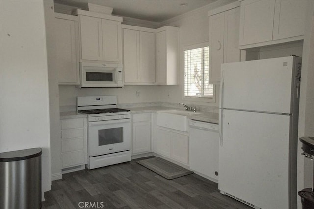 41559 Floyd Ct, Temecula, CA 92592 - kitchen with white appliances, dark wood-style floors, white cabinetry, a sink, and crown molding