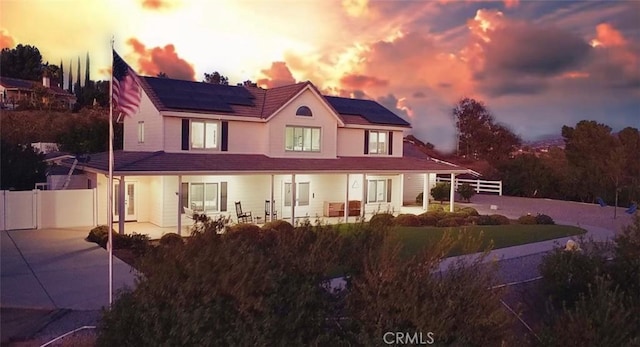 41559 Floyd Ct, Temecula, CA 92592 - view of front facade featuring solar panels and a patio area