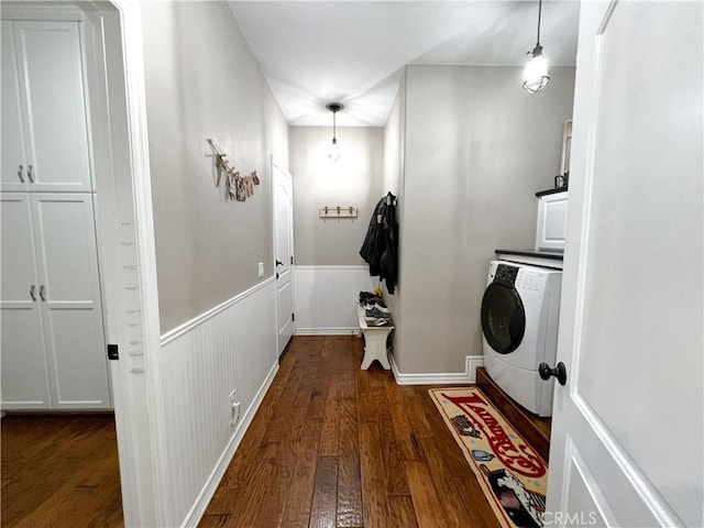 41559 Floyd Ct, Temecula, CA 92592 - laundry area with washer / clothes dryer, cabinet space, dark wood-type flooring, and a wainscoted wall