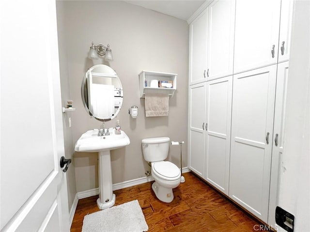 41559 Floyd Ct, Temecula, CA 92592 - half bath featuring toilet, wood finished floors, baseboards, a sink, and a closet