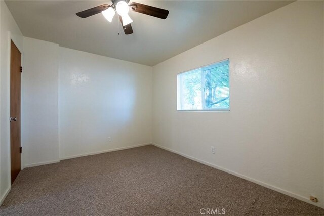 282 E 8th St, Chico, CA 95928 - empty room with carpet floors, a ceiling fan, and baseboards