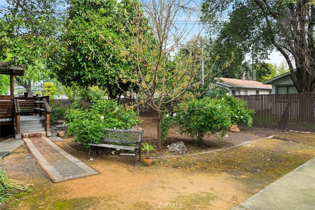 282 E 8th St, Chico, CA 95928 - view of yard with fence and a wooden deck