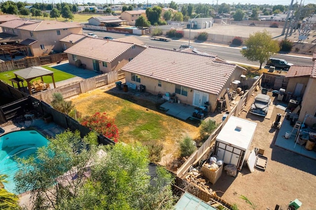 birds eye view of property with a residential view