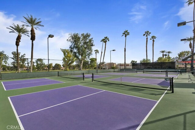 view of sport court with community basketball court and fence