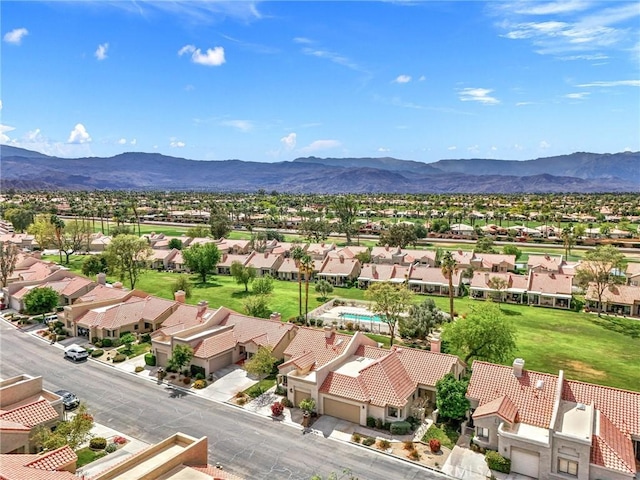 birds eye view of property featuring a residential view and a mountain view