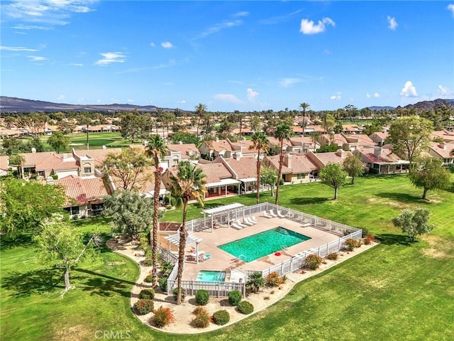 drone / aerial view featuring a mountain view and a residential view