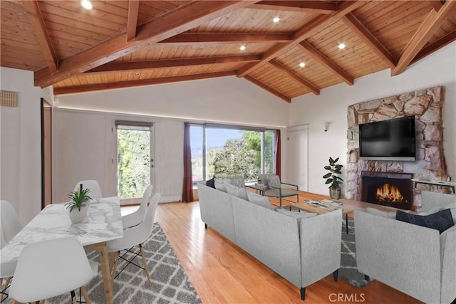 336 Redwood Dr, Pasadena, CA 91105 - living room with wood ceiling, light wood-style flooring, a stone fireplace, healthy amount of natural light, and recessed lighting
