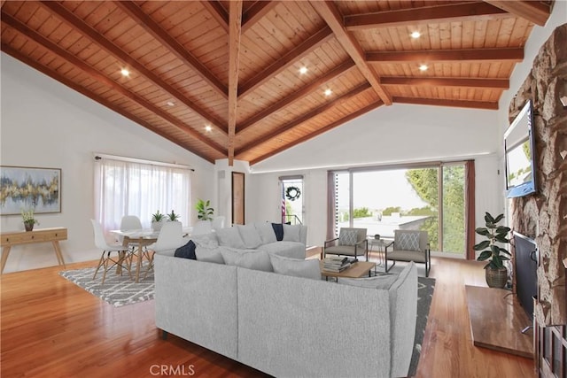 336 Redwood Dr, Pasadena, CA 91105 - living area featuring a wood ceiling with exposed beams, wood finished floors, high vaulted ceiling, a fireplace, and healthy amount of natural light