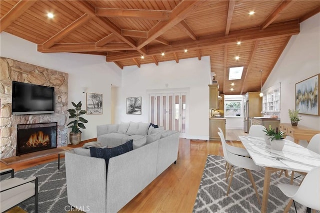 336 Redwood Dr, Pasadena, CA 91105 - living area featuring a wood ceiling with exposed beams, light wood-style flooring, a fireplace, and high vaulted ceiling