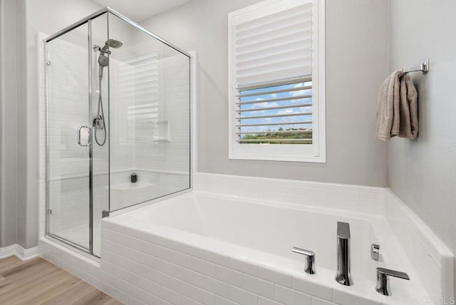 1518 Pepperwood Way, Oceanside, CA 92056 - bathroom with a stall shower, a garden tub, and wood finished floors
