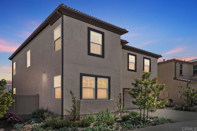 1518 Pepperwood Way, Oceanside, CA 92056 - view of front of property with stucco siding and an attached garage