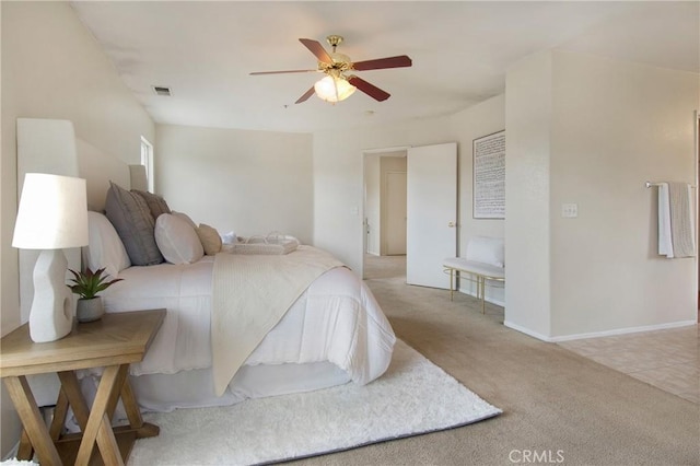 bedroom with visible vents, baseboards, a ceiling fan, and carpet floors