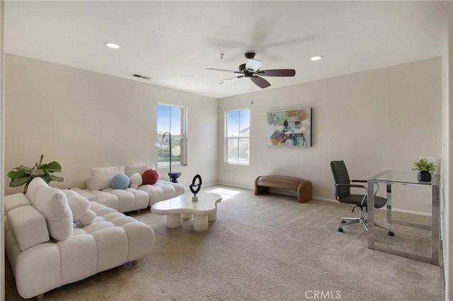 living area with carpet, a ceiling fan, visible vents, and recessed lighting