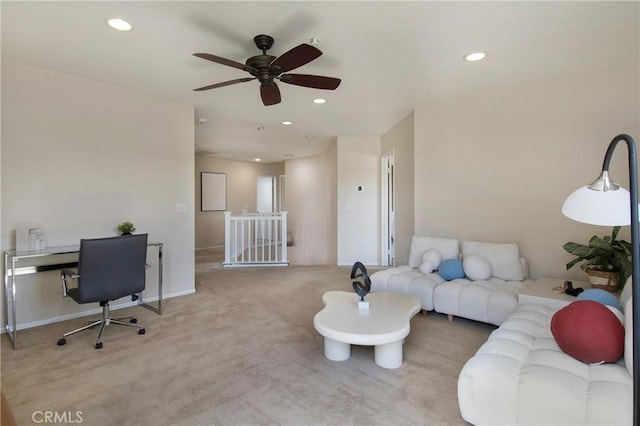 living room featuring baseboards, a ceiling fan, carpet, and recessed lighting