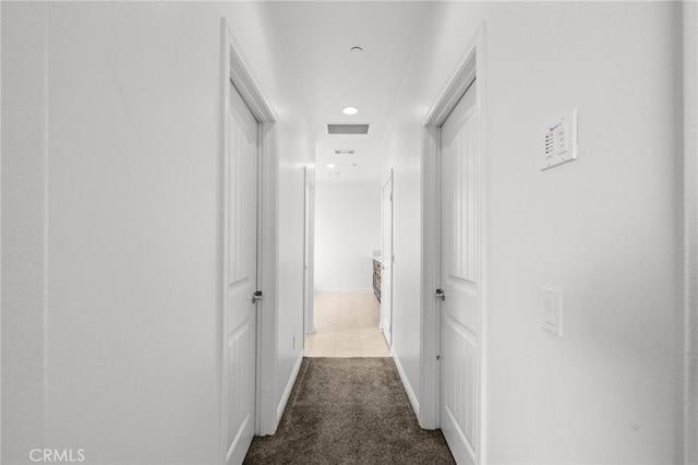 26382 Bramble Wood Cir, Menifee, CA 92584 - hall featuring dark carpet and baseboards