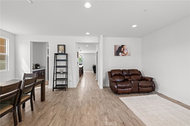 26382 Bramble Wood Cir, Menifee, CA 92584 - living room with light wood finished floors and recessed lighting